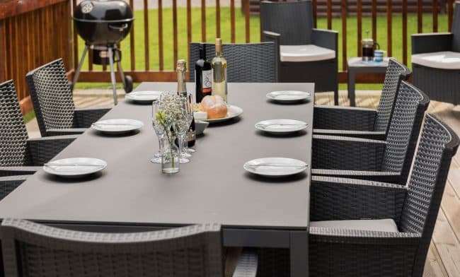 Family BBQ at luxury holiday lodge with Queenwood Holidays