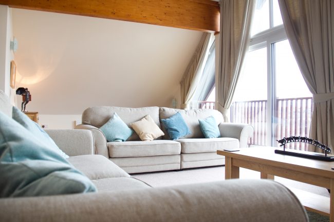 Holiday Lodge sitting room with balcony